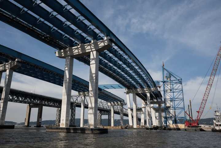 Work continues on the new Tappan Zee Bridge. The final steel girder assembly on the east part of the span has been completed; the girders on the western part are next.