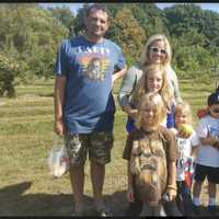 <p>The Mietz family with friends at Blue Jay Orchards in Bethel</p>