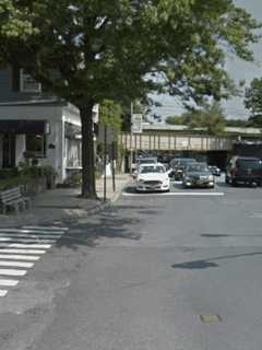 Garbage Truck Hits Metro-North Overpass In Rye, Spilling Oil