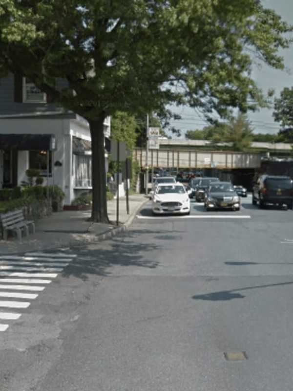 Garbage Truck Hits Metro-North Overpass In Rye, Spilling Oil