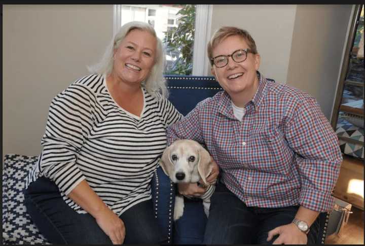 From left, Diane Galt and Betsy Kaminski, owners of Raleigh &amp; Co. in Greenwich, with their late beagle mix Raleigh who is the namesake of the store. The owners will be holding a monthly bark bar where pet lovers and their pets can come to socialize.