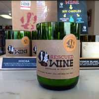 <p>Rescued Wine Candles.  The candles are in re-purposed wine bottles and a portion of the proceeds is donated to animal rescues.</p>