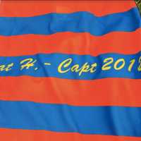 <p>On Tuesday afternoon at Tarrywile Park, the Danbury High School Boys Cross Country team dedicated its championship singlets to former teammate and captain Pat Healey who passed away in July.</p>