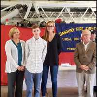 <p>Civilian Award recipients Lynda, Joseph and Karyssa Miguel. They were honored for giving aid to a Danbury Police Officer at Germantown Plaza.  Danbury Mayor Mark Boughton is on the right.</p>