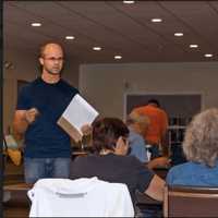 <p>Mark Howarth, Candlewood Camera Club president, at a club meeting</p>