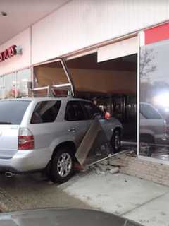 SUV Slams Into Business Storefront In Westport