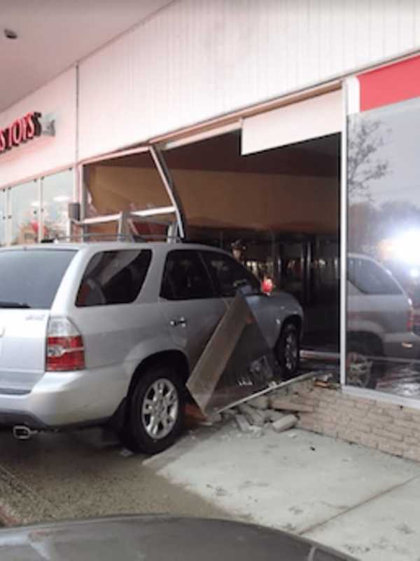 SUV Slams Into Business Storefront In Westport