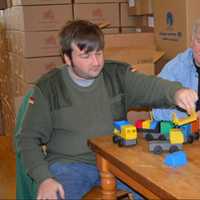 <p>Luke and Jim Barber, of Luke&#x27;s Toy Factory in Danbury, showing their line of toy trucks</p>