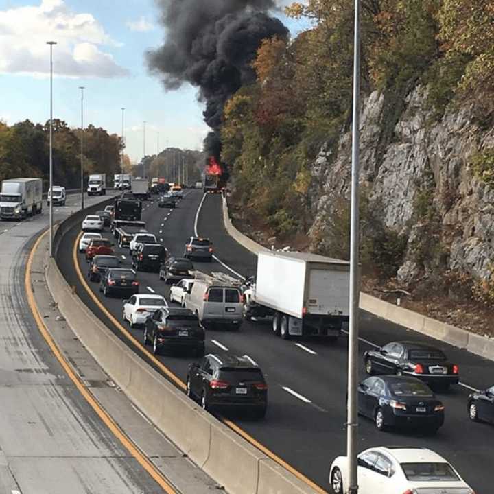 The truck fire as it was fully engaged on I-95 in Larchmont.