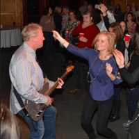 <p>Andy Schlesinger, co-founder and organizer of the event, rocking out at the 2015 Wilton Rocks for Food</p>