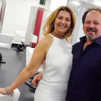 <p>Basil and Maria Kons of Piermont, N.Y. celebrate the grand opening of their Paramus salon.</p>