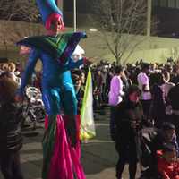 <p>A person on stilts at the balloon inflation party Saturday for the UBS Parade Spectacular, which steps off at noon Sunday.</p>