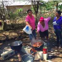 <p>The local neighborhood women prepare the lunch for the volunteers.</p>