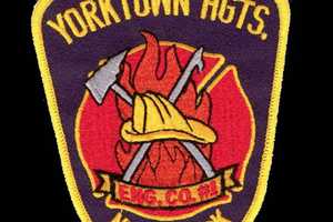 Car Crashes Down Embankment In Yorktown