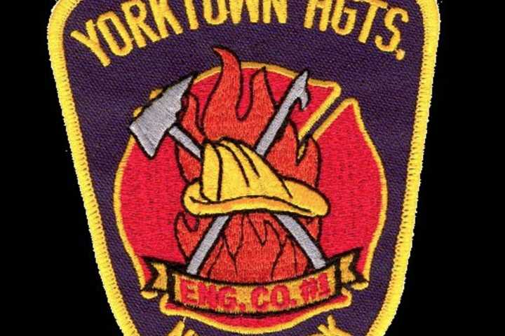 Car Crashes Down Embankment In Yorktown