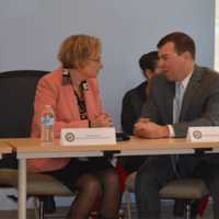 <p>Kathy Yacavone, CEO of Southwest Community Health Center in Bridgeport, chats with state Rep. Steve Stafstrom, D-129.</p>