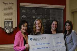 Realtors Donate Money To Children's Village