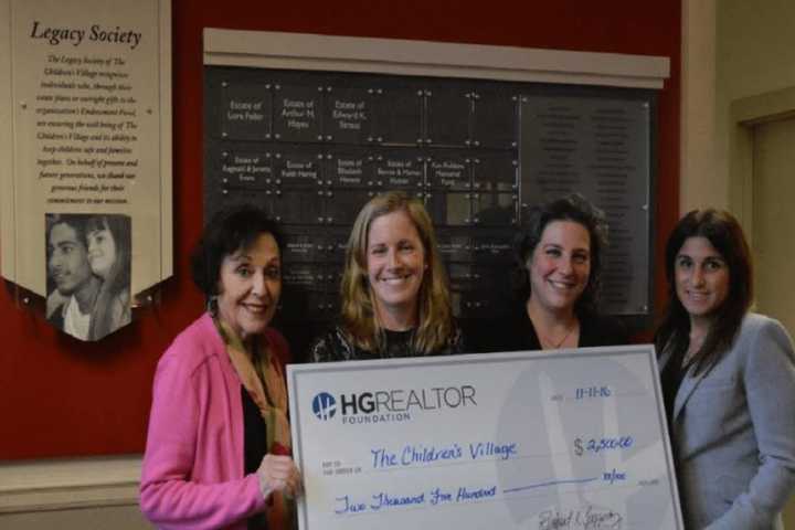 Realtors Donate Money To Children's Village