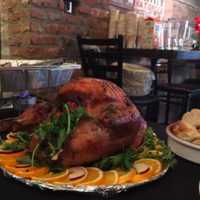 <p>Turkey was front and center at Little Drunken Chef&#x27;s annual free Thanksgiving buffet.</p>