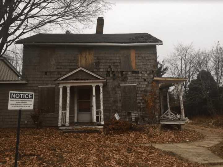 The empty home at 28 Catoonah St. in Ridgefield will finally be razed, with plans to build a pocket park in its place.