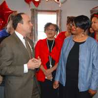 <p>Bridgeport Mayor Joe Ganim chats with Joann Smith in her new home on Oakwood Street.</p>