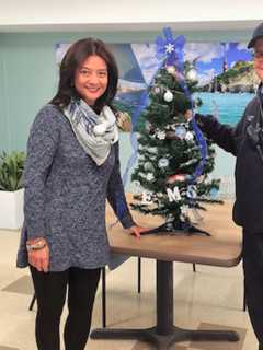 Stamford EMS Brings Holiday Cheer To Cassena Care With Christmas Tree Gift