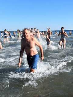 Supporters Of Greenwich's Kids In Crisis Take An Icy Dip On New Year's Day