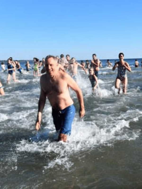 Supporters Of Greenwich's Kids In Crisis Take An Icy Dip On New Year's Day