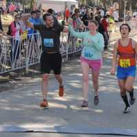 <p>Ryan Fox, right, of Danbury finished second in Saturday&#x27;s Charleston Marathon in South Carolina. Runners on the left are finishing the half marathon.</p>