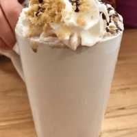 <p>Rocky Road hot chocolate topped with whipped cream and crushed peanuts at Sogno Coffee in Westwood.</p>