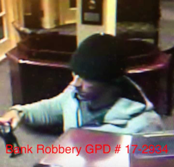 The suspect in an armed bank robbery in Greenwich on Wednesday afternoon.He&#x27;s being sought in Port Chester, N.Y. after crashing and abandoning his car during a police pursuit.