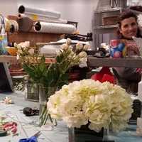 <p>Amelia Soderquist, owner of Flowers By Whisconier, with her granddaughter.</p>