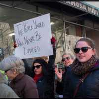 <p>Marchers make their way down Route 9.</p>