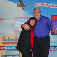 <p>New Fairfield couple Mike and Marian Goldstein at their newly expanded Brookfield sign business, Unlimited Signs, Designs &amp; Graphics.</p>