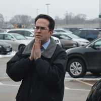 <p>DOT Supervising Rail Officer Craig Bordiere, left, listens to questions from food truck owners interested in setting up shop at the Fairfield Metro train station.</p>