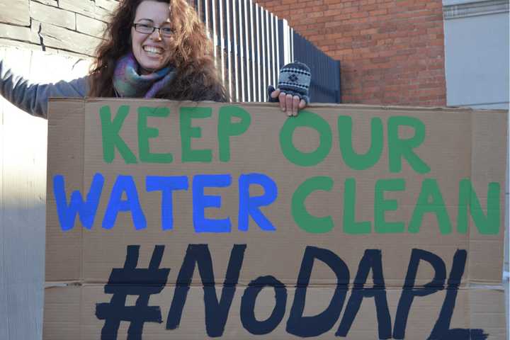 Dakota Access Pipeline Protesters March On Banks In Stamford