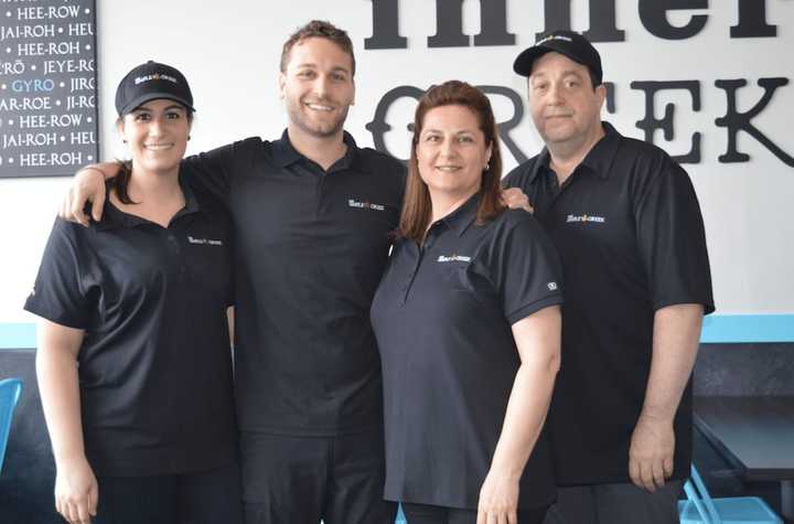 From left, Christina, George, Maria and John Perstesis, who just opened the Simple Greek in Norwalk, which will be having a grand opening on Friday from 11 a.m. to 3 p.m.