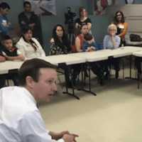 <p>U.S. Sen. Chris Murphy speaks to immigrants and immigrant supporters Thursday afternoon in Stamford.</p>