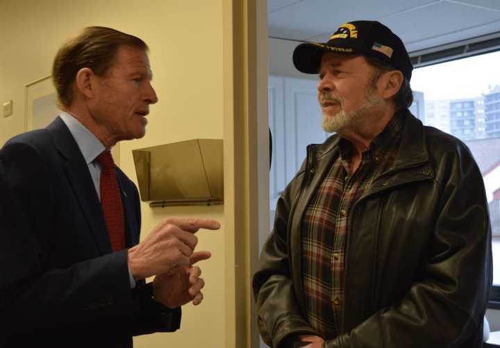 U.S. Sen. Richard Blumenthal speaks to Marine Corps Veteran Jeff Calcott about Calcott&#x27;s healthcare concerns during a visit Thursday at the Stamford Outpatient Veterans Clinic.