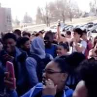 <p>Danbury High School students stage a protest Thursday over a harassment incident last month in the parking lot.</p>