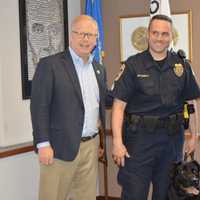 <p>From left, Danbury Mayor Mark Boughton; Sgt. James Antonelli, K-9 Unit Supervisor, Rocky and Danbury Police Chief Patrick Ridenhour.</p>