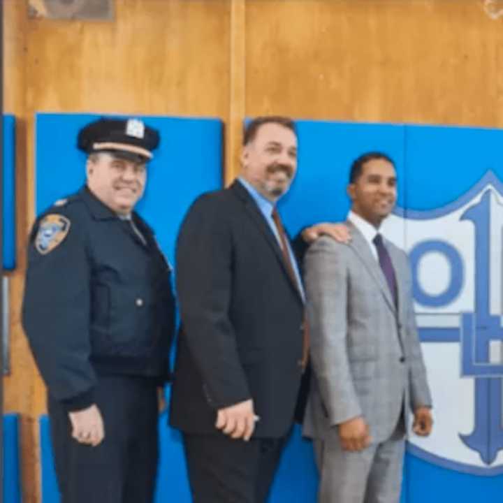 Mount Vernon Mayor Richard Thomas, pictured with former Police Commissioner Ronald Fatigate (second from left)