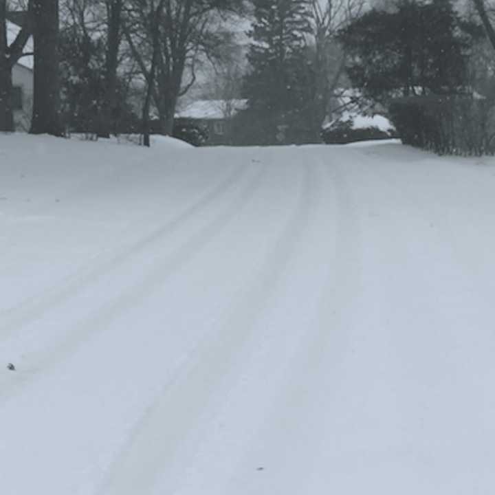 Snow is filling in the tracks of a pair of vehicles whose drivers braved Tuesday&#x27;s snowstorm in Stamford.