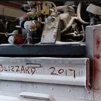 <p>A snow-covered Red Hook Fire Department truck after returning from its first call of the day Tuesday, an auto accident. Much of Western Dutchess saw 26 inches or more of accumulation.</p>