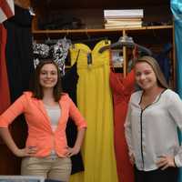 <p>From left Sarina Gersten and Alasandra Primavera with prom dresses they have collected to be given to teens in need.</p>