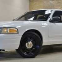 <p>An older model Ford Crown Victoria, similar to the one involved in the incident.</p>