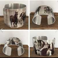 <p>Wild Horse photography on aluminum cuffs</p>