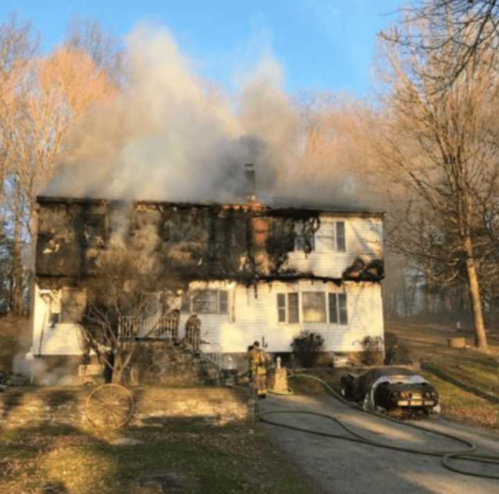 The fire broke out in the attic of the two-story house on Wilson Road.