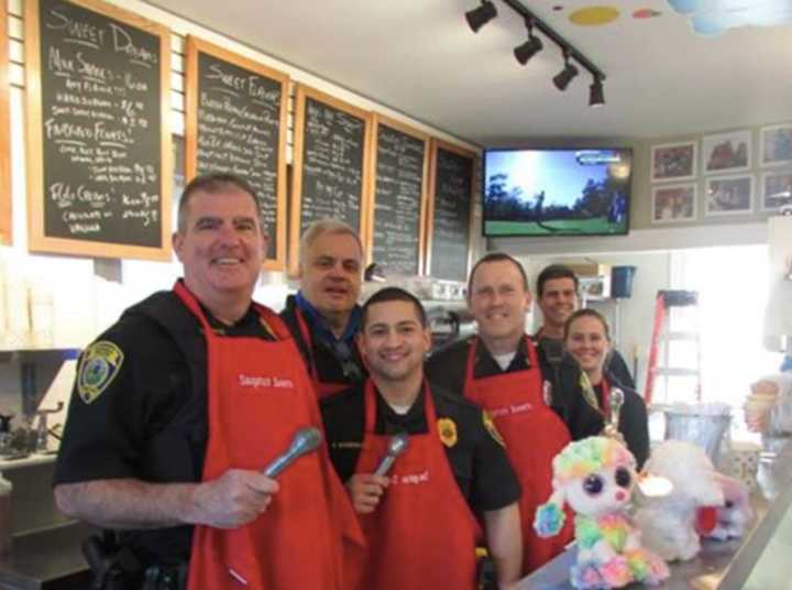 Fairfield police officers trade their handcuffs for ice cream scoops this week to raise money for their scholarship fund.