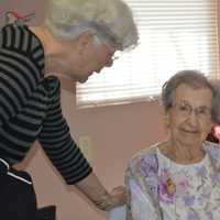 <p>Margie Correnti, left, congratulates her mother-in-law Christine Correnti for having May 12 named Christine Correnti Day in Bridgeport.</p>